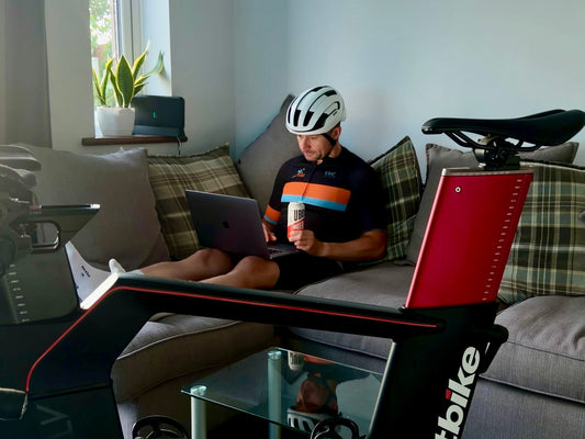 cyclist sitting on couch calculating their FTP